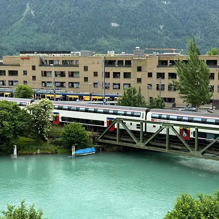 River-kissed Retreat With Iconic Jungfraujoch View