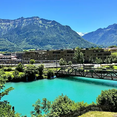 River-kissed Retreat With Iconic Jungfraujoch View